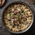 Creamy mushroom risotto made with Arborio rice, mixed mushrooms, and Parmesan cheese
