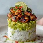 Close-up honey lime chicken stack avocado sear marks