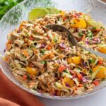 Thai chicken salad glass bowl peanut dressing lime