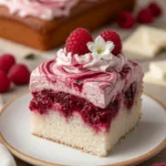 White chocolate raspberry cake slice jam filling soft